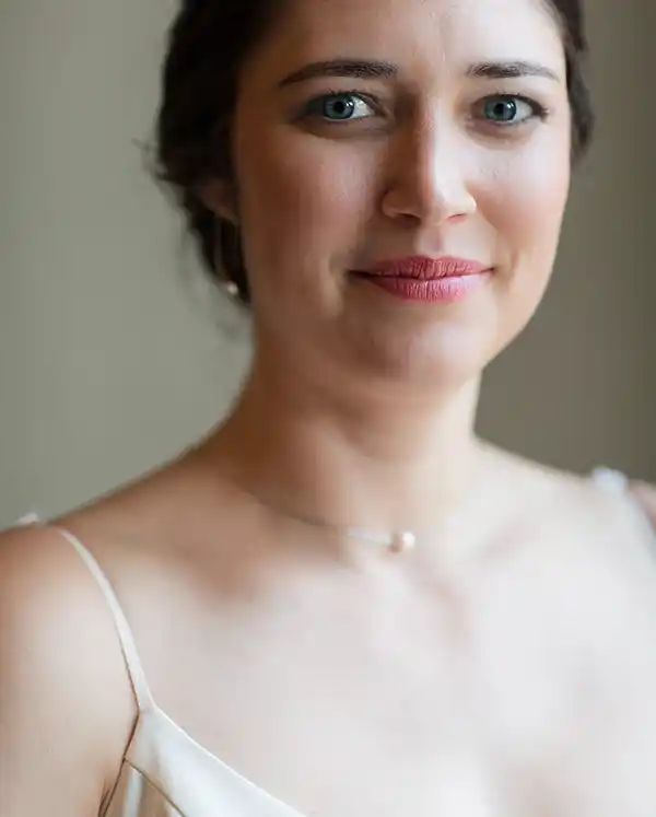 Bride in full wedding attire portrait at Jay Peak Resort during Vermont fall wedding.