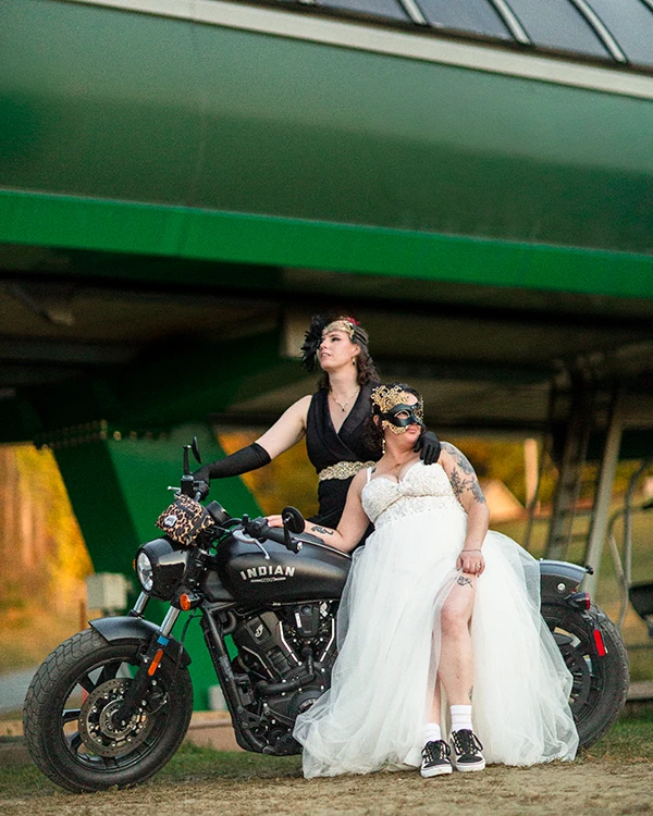Brides on a motor cycle below the chairlift at Burke Mountain Ski resort