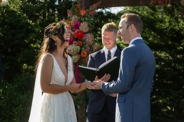 A couple gets married at Old Lantern in Charlotte Vermont. The bride is laughing
