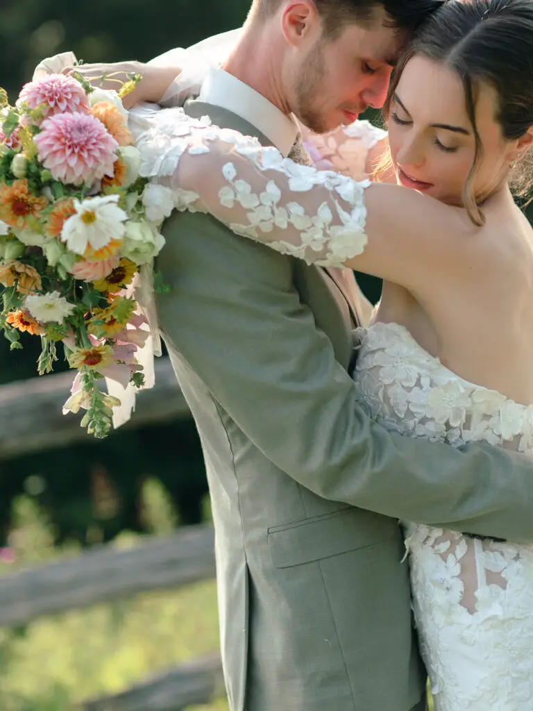 bride and groom hug