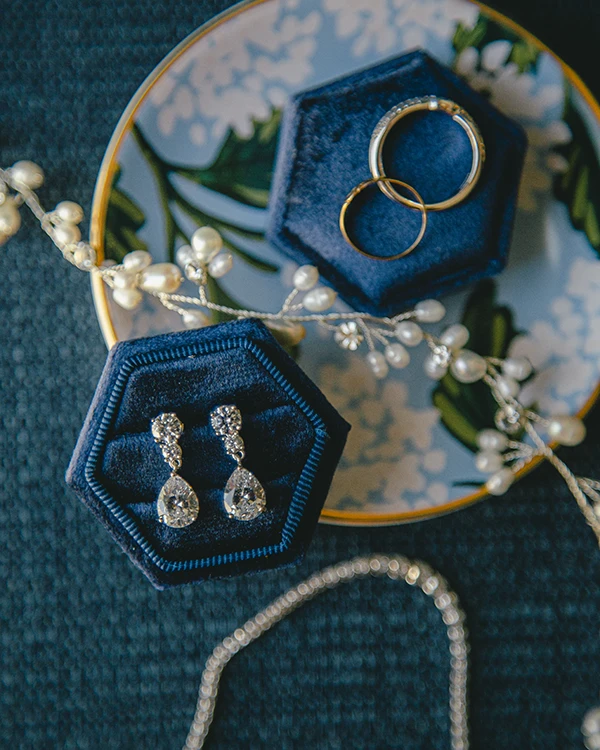 A brides something blue and her wedding jewelry