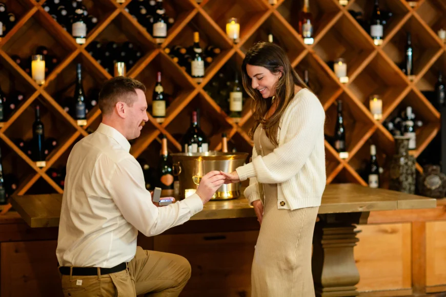 the perfect proposal moment of yes in the Hermitage Inn Wine Cellar in west Dover Vermont