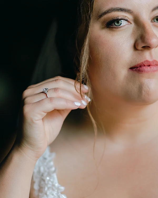 detail of a Vermont bride girl with earring