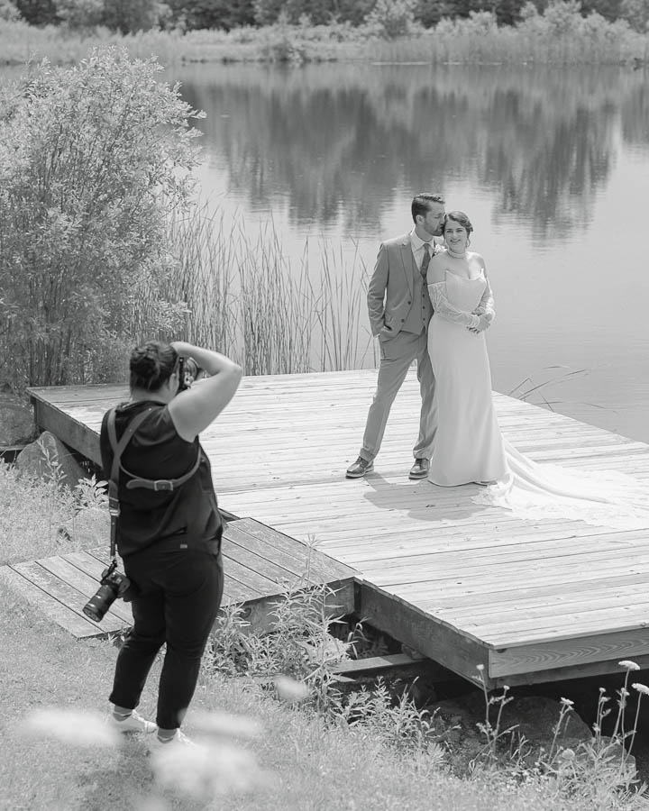 Lindsay Raymondjack Wedding Photographer working at the Ponds in Bolton Vermont taken by Dane Martin of 802vermontphotography.com