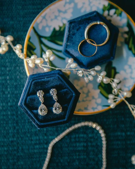 A brides something blue and her wedding jewelry