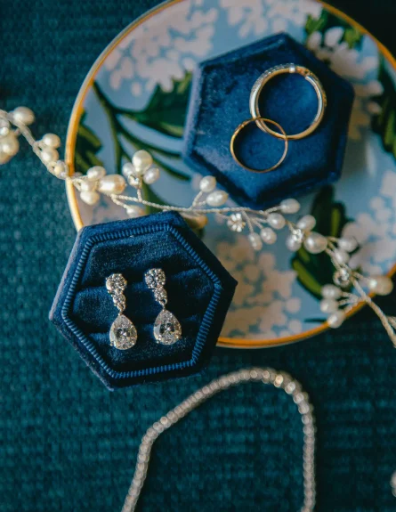 A brides something blue and her wedding jewelry