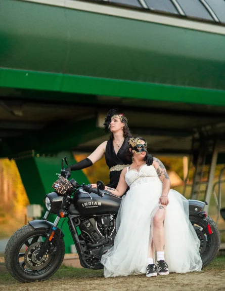 Brides on a motor cycle below the chairlift at Burke Mountain Ski resort