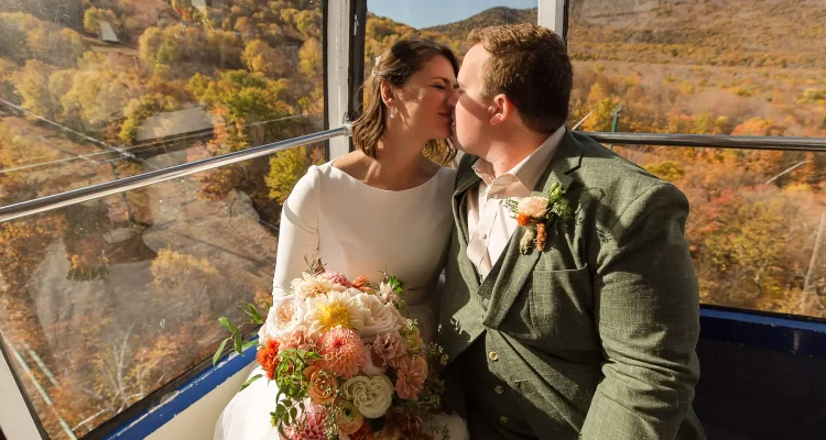 Bride and groom ride the Jay peak tram together